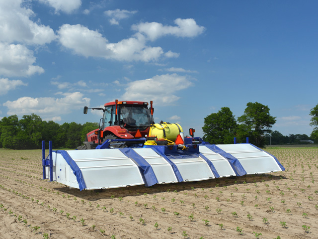 A See and Spray prototype works in a Marianna, Arkansas, cotton field. (Photo courtesy of Blue River Technology)